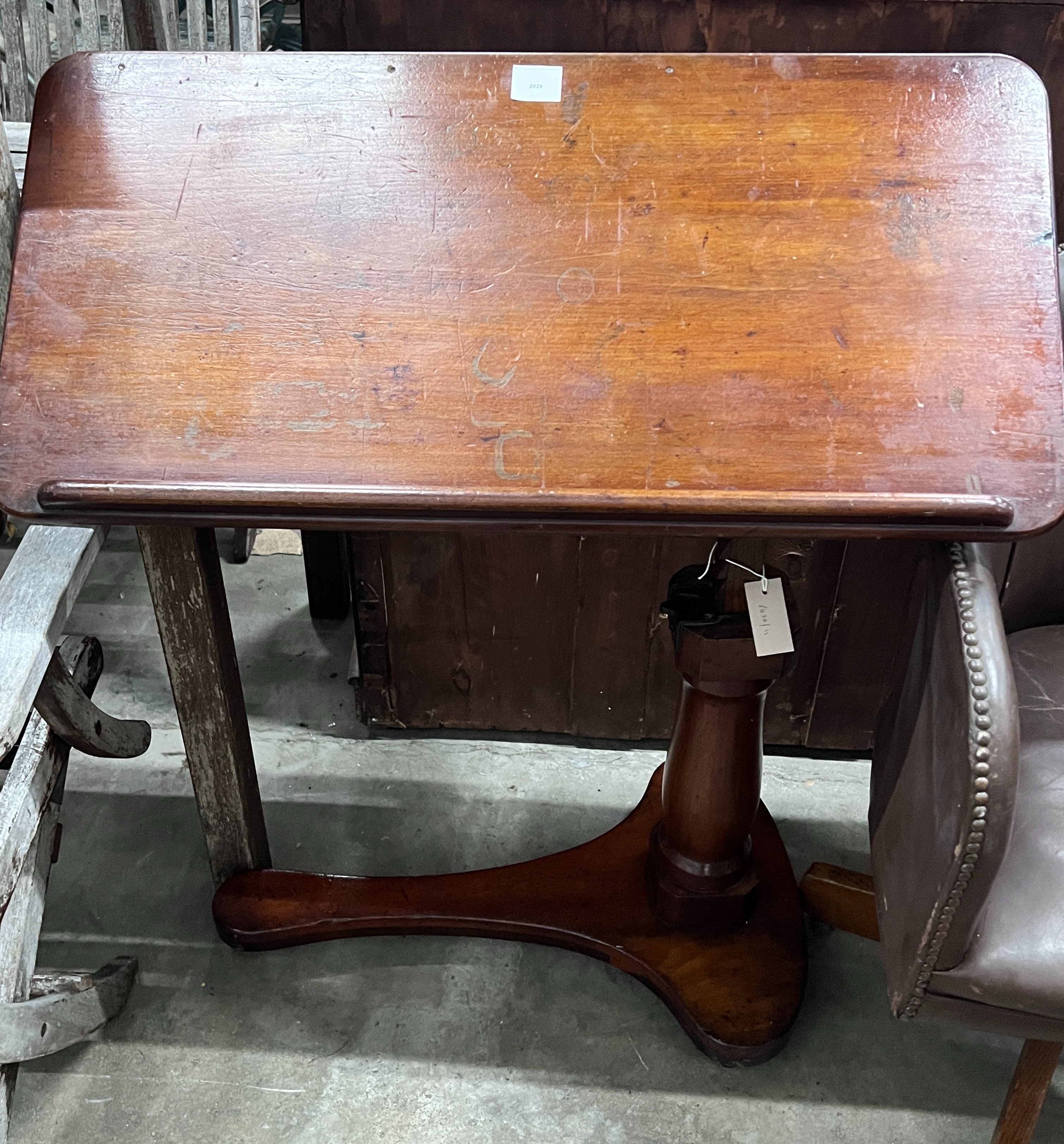 A Victorian mahogany adjustable reading lamp, width 83cm, depth 40cm